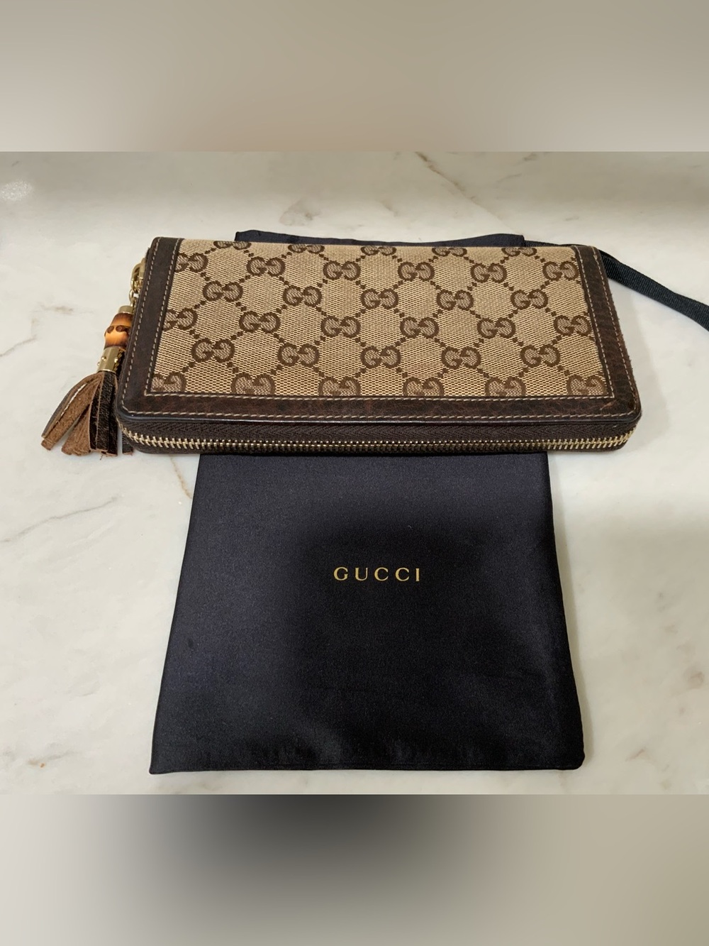 Gucci Brown and Beige Monogram Zip Wallet with Tassel Charm